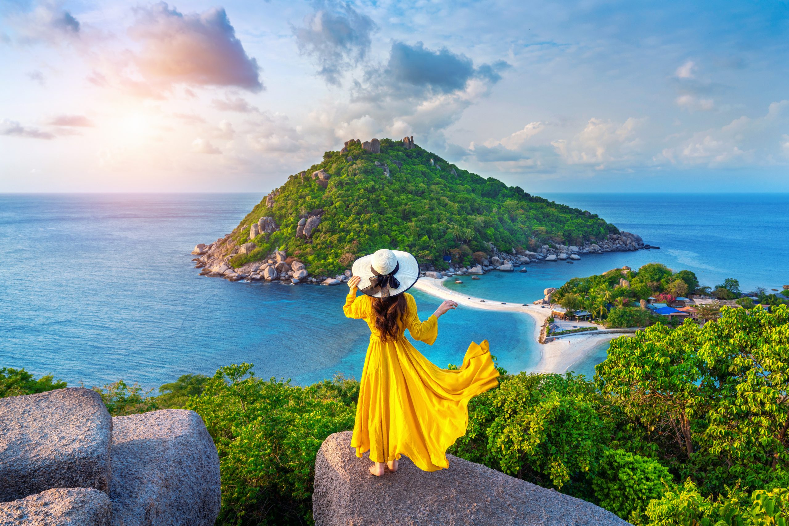 Beautiful girl standing on viewpoint at Koh Nangyuan island near Koh Tao island, Surat Thani in Thailand.